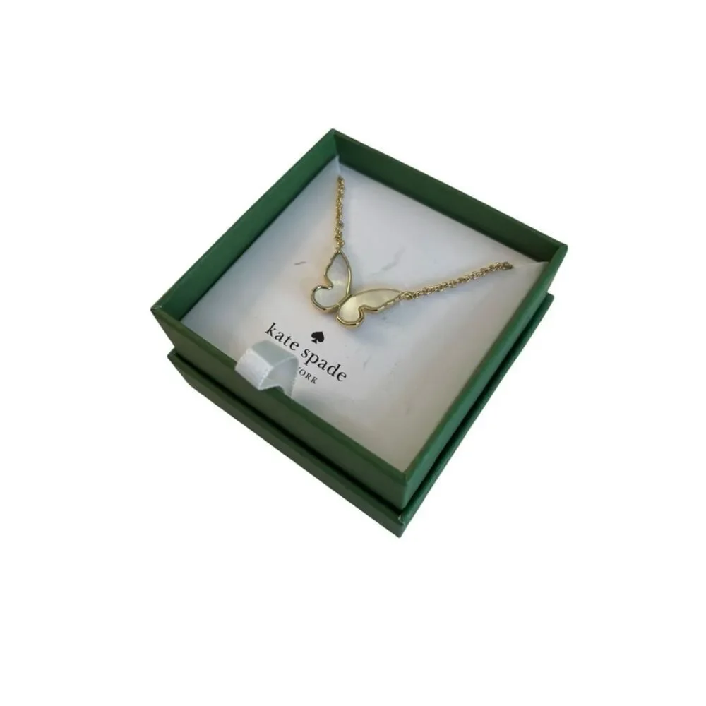 Kate Spade New York “All a Flutter” Mini Butterfly Pendant Necklace.